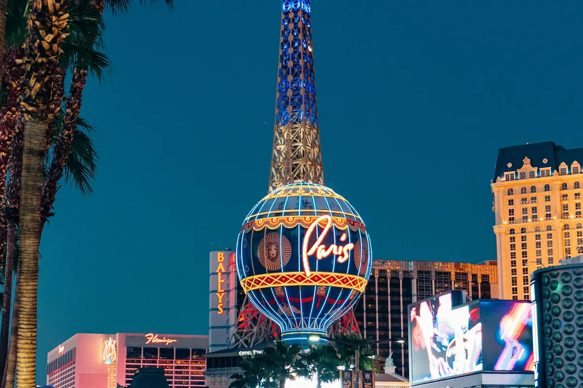 Las Vegas street lit by casino signs at night